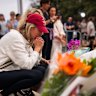 Jodie Gien visits the memorial at Bondi Pavilion, two days after the mass shooting at Bondi Beach. 