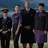 Cabin crew and ground staff Air NZ uniforms featuring the Kōwhai print by designer Emilia Wickstead and artist Te Rangitu Netana.