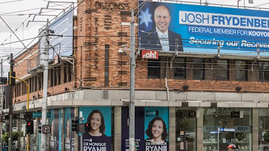 Josh Frydenberg and rival Monique Ryan with duelling advertising in the Kooyong electorate.