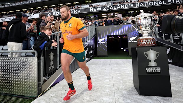 James Slipper of Australia runs onto the field in his 150th game in New Zealand