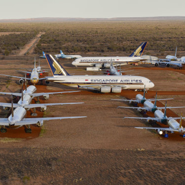 Airbus A380s, Boeing MAX 8s and other smaller aircraft grounded at a storage facility in Alice Springs in 2020 because of the coronavirus pandemic.