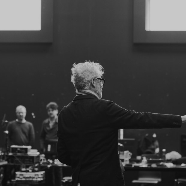 Brett Sheehy, Melbourne Theatre Company’s artistic director from 2012 to 2021, says, “Back to Back, to me, has been an eponymous company in everything but name – it’s been ‘Bruce Gladwin’s Back to Back’.”  Gladwin is pictured here directing the ensemble in rehearsal.