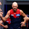 Max Gawn of the Demons leads his team out onto the field