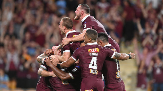 Queensland celebrate a famous Origin series win.