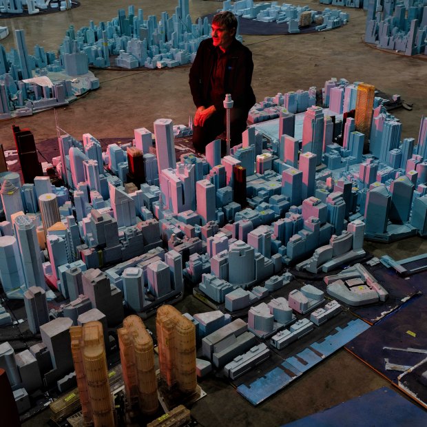 Dr Matt Glanville,  the founder of CPP Wind in Australia, with a scale model of Sydney in the company’s laboratory.