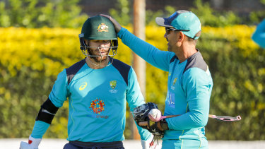 Langer (right) is thrilled to have David Warner and Steve Smith back in the fold.