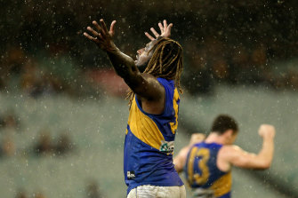Nic Naitanui of the Eagles celebrates their victory and his return to the game after a knee reconstruction.