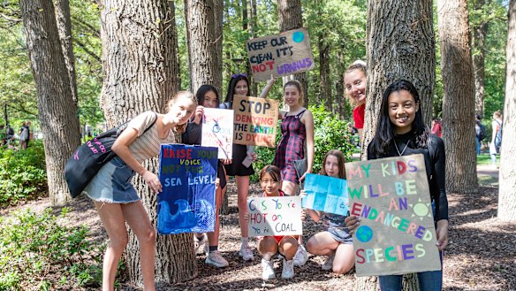 Climate strikers Emily Thomson, 14, Christina Hood, 14, Astrid Smyth, 14, Sarai Khin, 14, Lily Saxon, 14, Matilda Von Garvel, 14, Autumn Starbird and event organiser Maanha Manzur, 14.