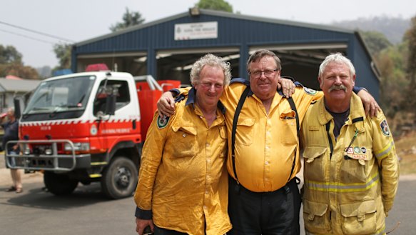 Batlow volunteer firefighters Jeff Kynaston, Darryl Watkins (captain) and Brian Droscher who stayed to fight fires impacting Batlow the previous Saturday.