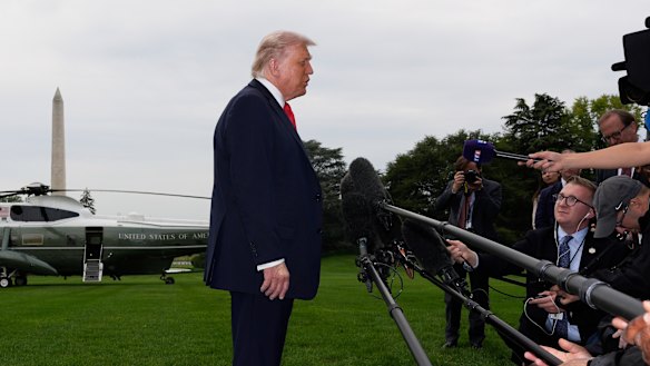 Donald Trump speaks to journalists during his testy confrontation with the ABC’s John Lyons on Wednesday.