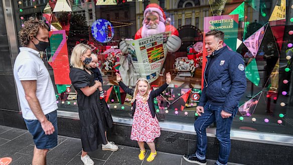 Stage ONE creative director John Kerr (right) with Sam, Anthea, Hamish and Camilla McCombe outside the Bourke Street windows.