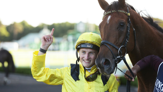 English jockey Tom Marquand with Addeybb after winning the Queen Elizabeth Stakes last year for William Haggas.