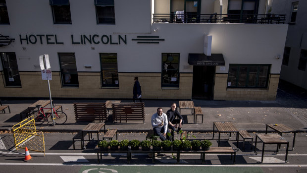 Publican Iain Ling (L) and RMIT urban design researcher Thami Croeser in a car space outside Hotel Lincoln that could be used to serve patrons. 