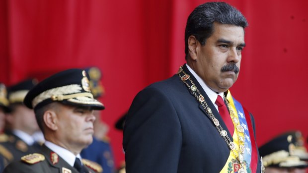 Venezuela's President Nicolas Maduro watches a military parade in May.
