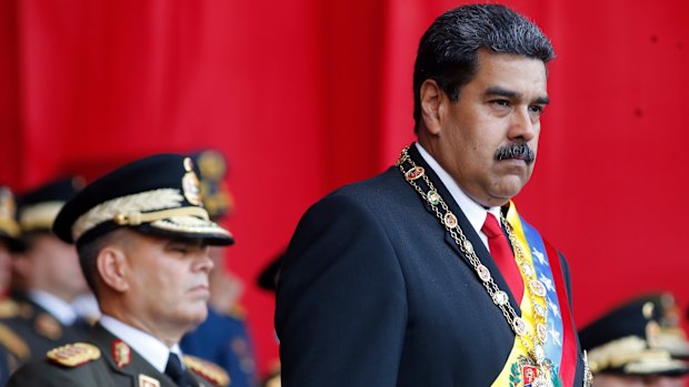 Venezuela's President Nicolas Maduro watches a military parade in May.