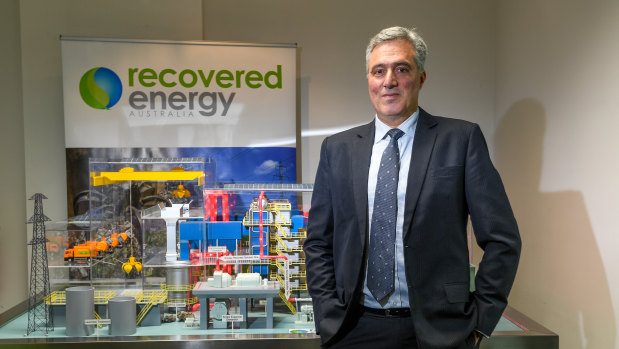 Recovered Energy Australia director Ian Guss with a model of the proposed waste to energy plant in Laverton North.