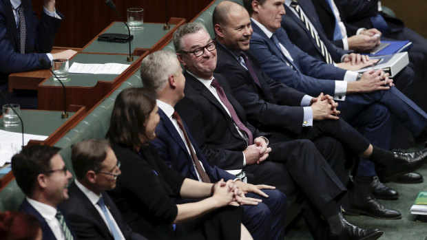 Christopher Pyne takes his seat after delivering his valedictory speech.