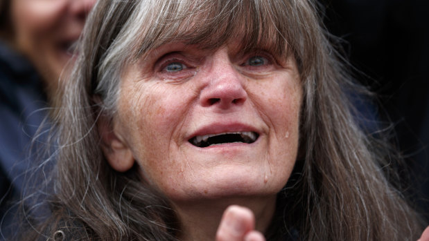 A supporter of President Donald Trump cries as he arrives for a campaign rally at Bozeman Yellowstone International Airport.