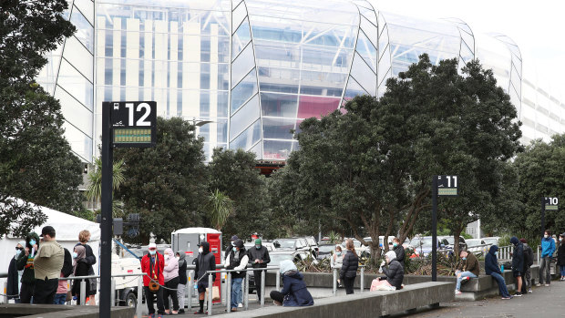 People line up for a Covid-19 test at Eden Park  in Auckland on Friday. 