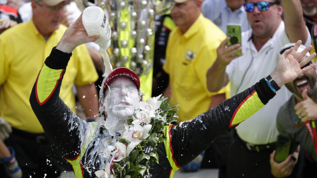Frenchman Simon Pagenaud celebrates the traditional way after winning the Indy 500.