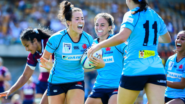 Rookie NSW winger Maya Stewart pops up after scoring her debut try in the Waratahs' win over Queensland at Leichhardt Oval.
