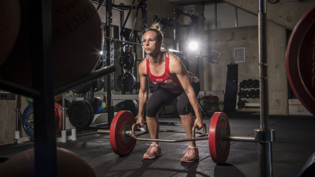 Time to lift: Paige Hadley works through a tough training session.