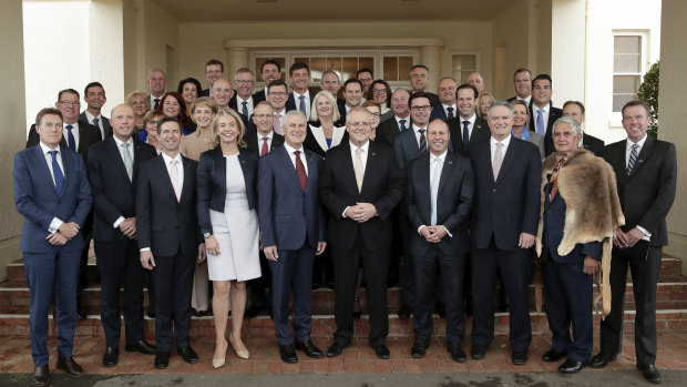 Prime Minister Scott Morrison poses for photos with his new-look ministry.