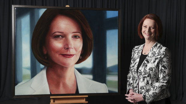 Former Prime Minister Julia Gillard with her official portrait painted by Vincent Fantauzzo.