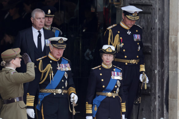 An officer at the funeral salutes all four of the Queen’s children, Prince Andrew, Prince Edward, King Charles III and his sister Anne, the Princess Royal. 