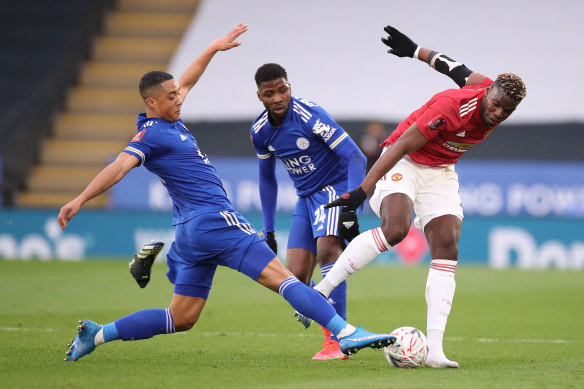 Paul Pogba is challenged by Youri Tielemans at the King Power Stadium.