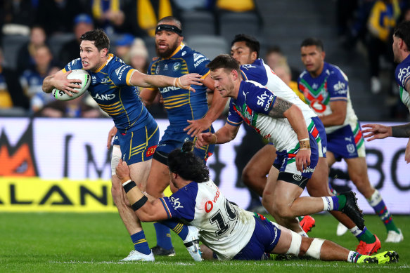 Mitchell Moses looks to make a break for Parramatta.