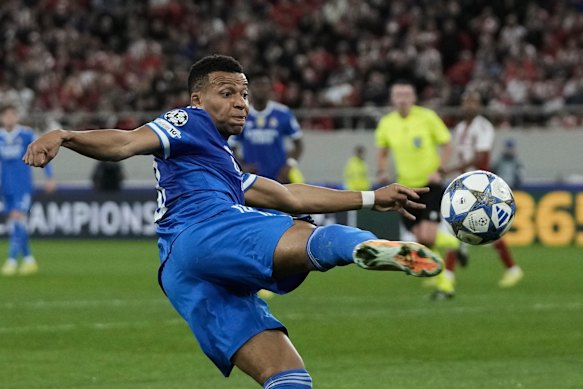 Kylian Mbappe unleashes a shot for Real Madrid.