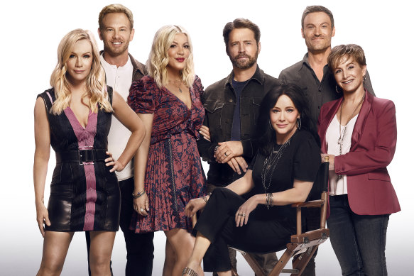 The original cast of 90210 returned for a satirical reboot in 2019. Shannen Doherty is seated at the front.