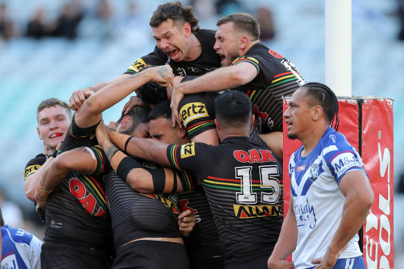 James Tamou crashes over the line for his first try of the season. 