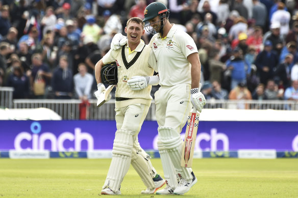 Australia’s Marnus Labuschagne (left) and Mitchell Marsh leave the field at the end of play.