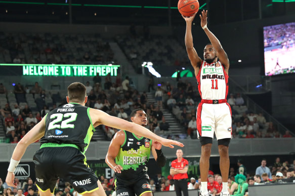 Perth’s Bryce Cotton shoots during a powerhouse performance for the Wildcats.