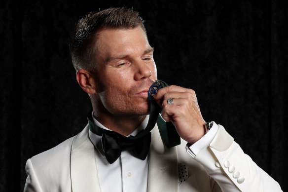 Sealed with a kiss: David Warner with his Allan Border Medal.