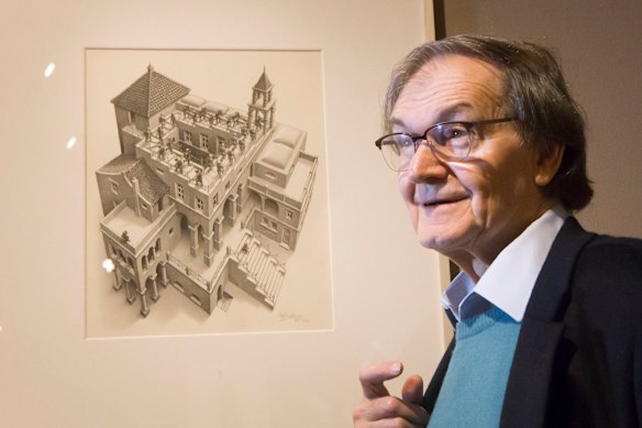 Penrose with one of M.C. Escher’s works.