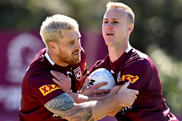 Queensland halves Cameron Munster and Daly Cherry-Evans at training last week.