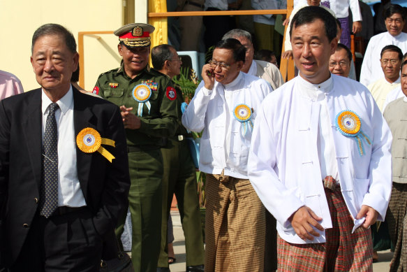 Lo Hsing Han, left, and his son Stephen Law at the opening of the Yangon international airport in 2007.