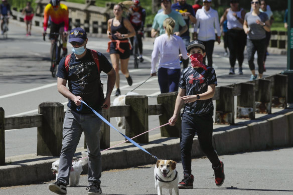 People enjoy the outdoors in New York's Central Park as some lockdown measures eased over the weekend.