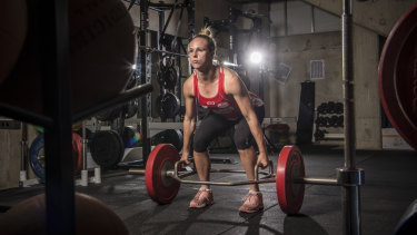 Time to lift: Paige Hadley works through a tough training session.