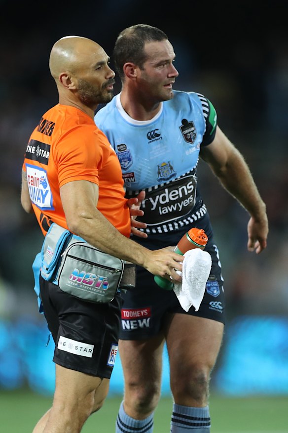 Boyd Cordner is helped from the field.
