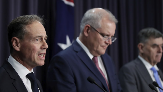 Health Minister Greg Hunt, Prime Minister Scott Morrison and Chief Medical Officer Brendan Murphy address the media about their coronavirus plan in March.