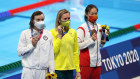 Silver medalist Katie Ledecky USA), gold medallist Ariarne Titmus of Team Australia and bronze medalist Bingjie Li of Team China pose with their medals for the Women’s 400m Freestyle Final on day three of the Tokyo 2020 Olym