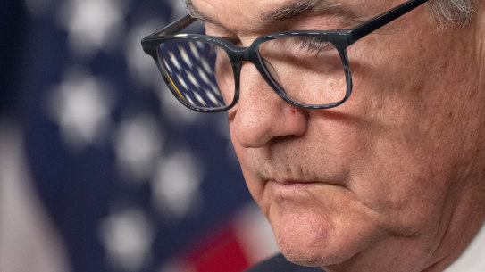 Powell pauses during his press conference.