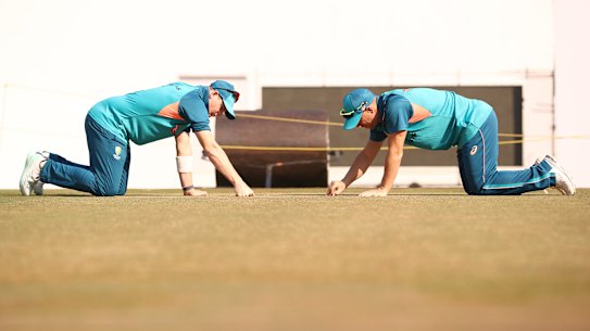 Steve Smith  and David Warner of Australia check the pitch during a training session at Vidarbha Cricket Association Ground on February 7.