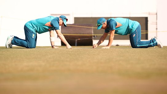 Steve Smith  and David Warner of Australia check the pitch during a training session before the Nagpur Test.