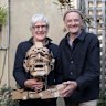 Rod Holdaway (left) holds a bust he created of Merrick Fry.