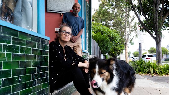 Mandy King and Fabio Cavadini (pictured with their neighbour’s dog, Ella) are voting for Inner West Council to demerge into its previous three councils.